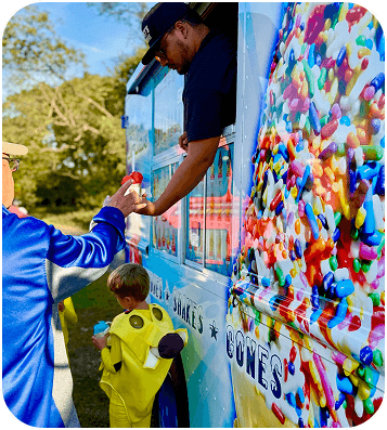 Child enjoying blue soft serve